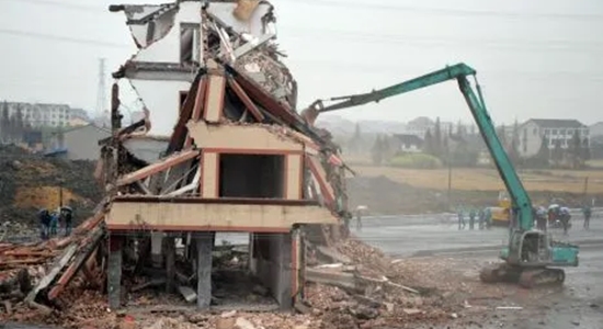 Bulldozed home in China